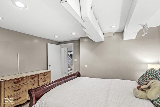 bedroom with recessed lighting