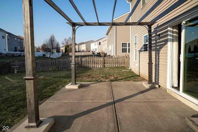 view of patio with a residential view, fence, and a pergola