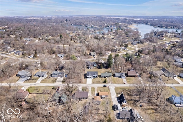 bird's eye view with a residential view and a water view