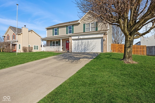 traditional-style house with brick siding, an attached garage, driveway, and fence