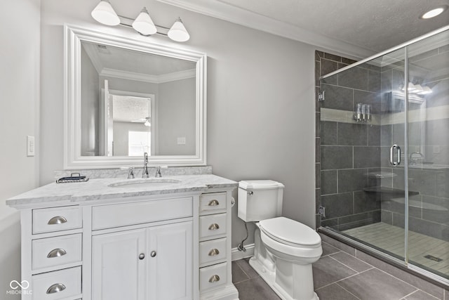 full bath featuring tile patterned floors, toilet, ornamental molding, and a shower stall