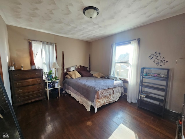 bedroom featuring wood-type flooring