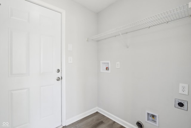 laundry room featuring electric dryer hookup, dark wood-type flooring, baseboards, hookup for a washing machine, and laundry area