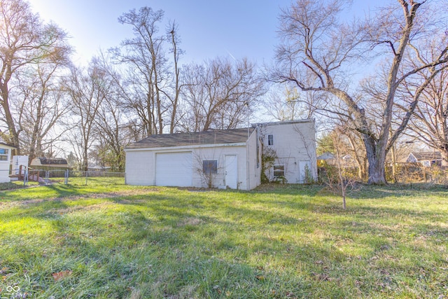 view of outbuilding with an outbuilding and fence