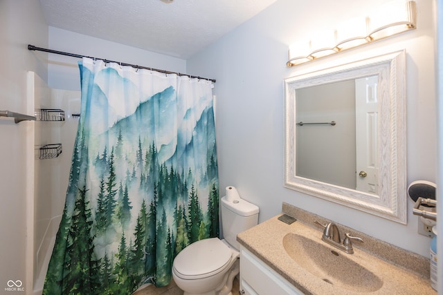 bathroom featuring a textured ceiling, toilet, vanity, and a shower with curtain