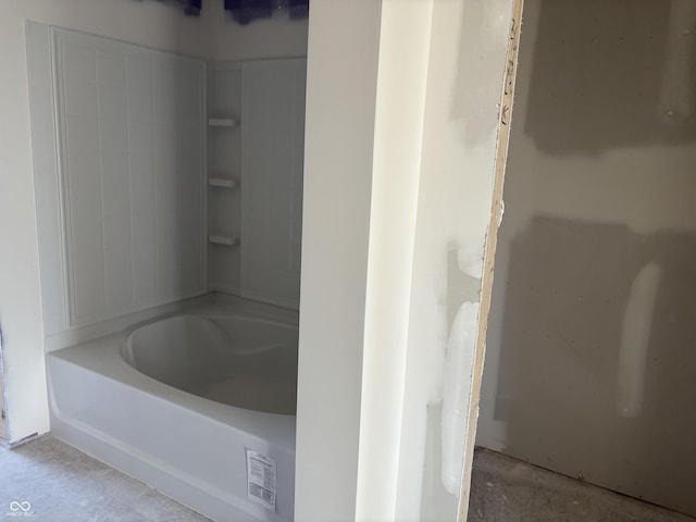 bathroom featuring visible vents and a bathing tub