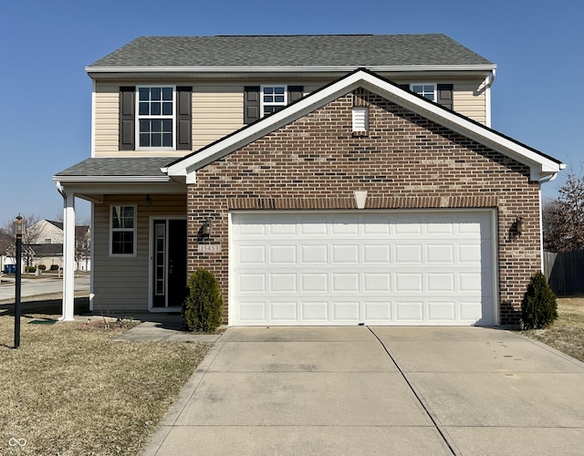 traditional-style house featuring a garage, brick siding, driveway, and roof with shingles