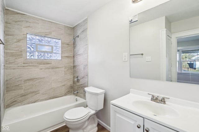 full bath featuring vanity, toilet, and washtub / shower combination