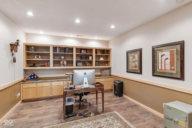 office featuring recessed lighting, baseboards, visible vents, and light wood-style flooring
