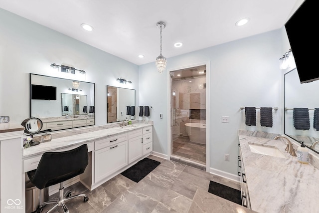 bathroom with recessed lighting, a sink, marble finish floor, and a shower stall