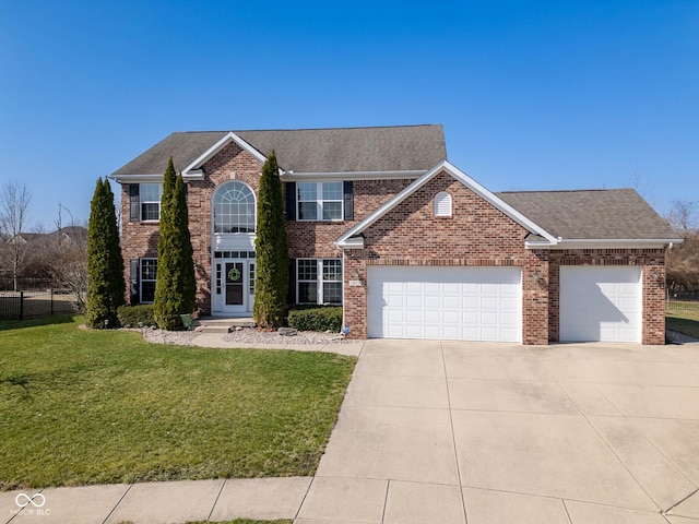 colonial house featuring brick siding, concrete driveway, a front lawn, and a garage