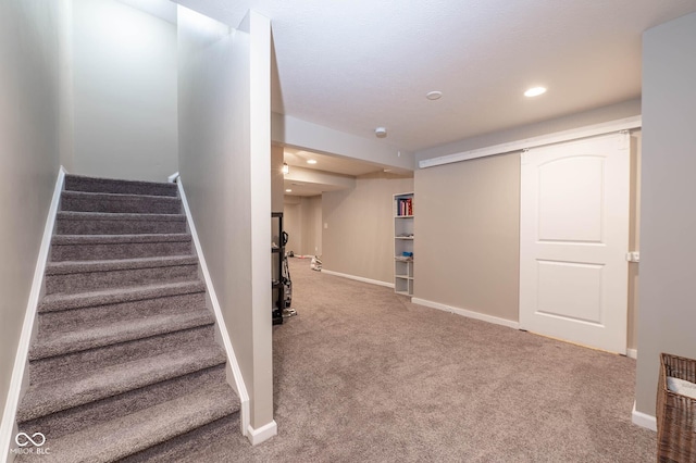 stairs featuring carpet flooring, recessed lighting, and baseboards