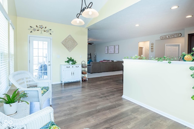 interior space featuring recessed lighting, ceiling fan, baseboards, and wood finished floors