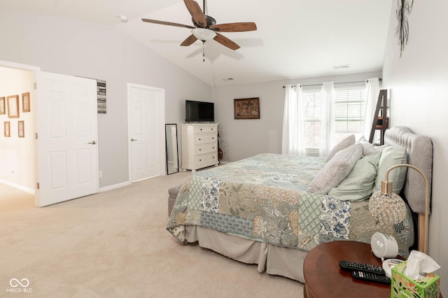 bedroom with ceiling fan, baseboards, lofted ceiling, and carpet floors