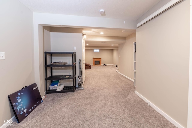 hall with recessed lighting, baseboards, and carpet