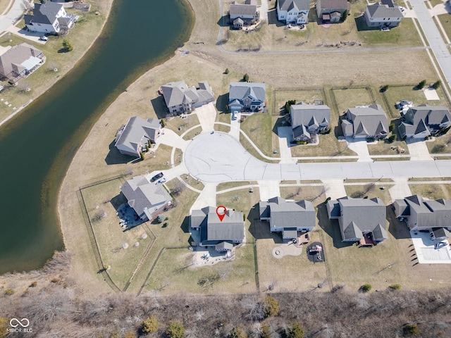 birds eye view of property with a residential view