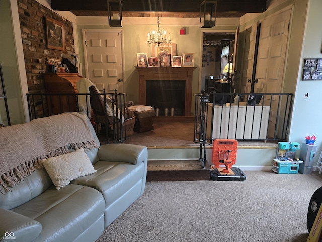 living room featuring a fireplace, carpet floors, and a chandelier