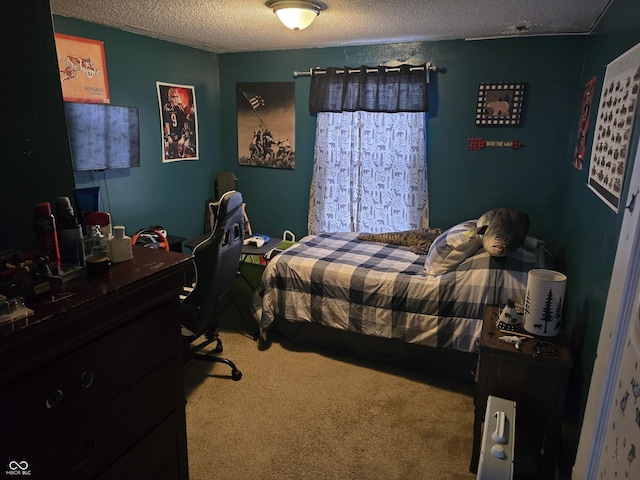 carpeted bedroom with a textured ceiling