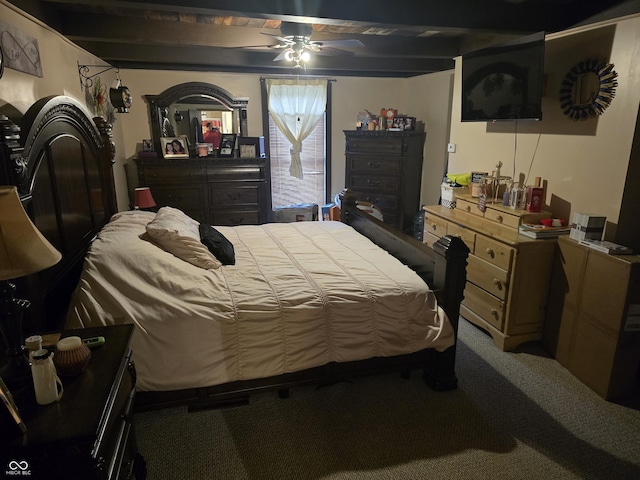 bedroom featuring beamed ceiling, carpet floors, and ceiling fan