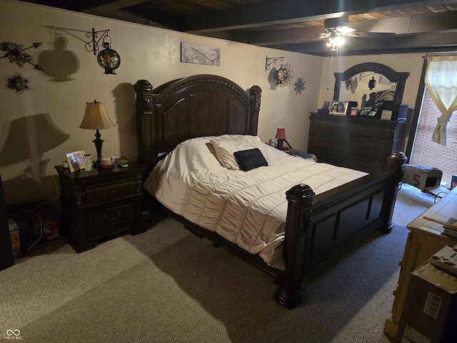 bedroom featuring beam ceiling, light colored carpet, and ceiling fan