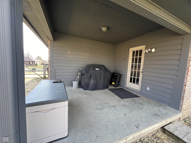 view of patio featuring a grill