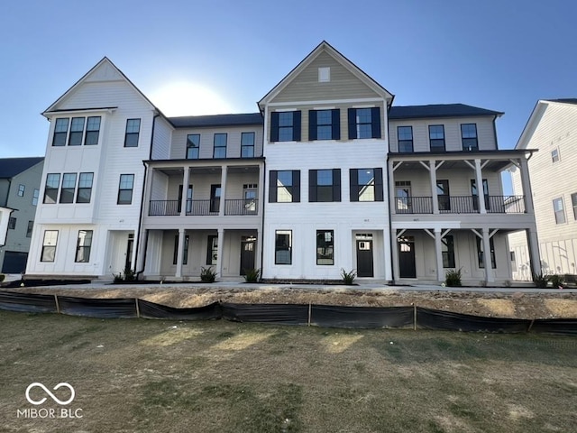 457 Mariposa Trl, Carmel, IN 46032 - townhome / multi-family property featuring a balcony