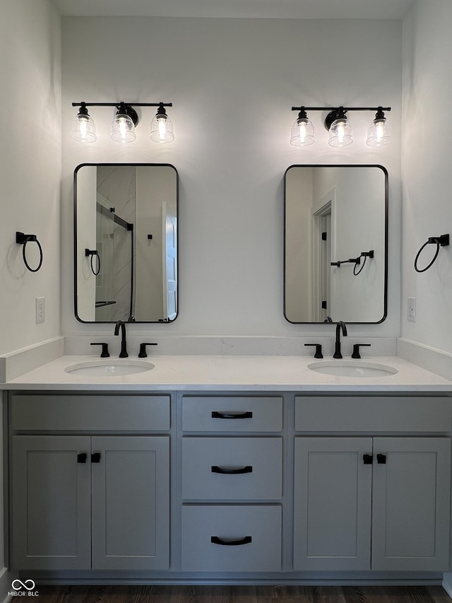 457 Mariposa Trl, Carmel, IN 46032 - bathroom featuring double vanity and an enclosed shower