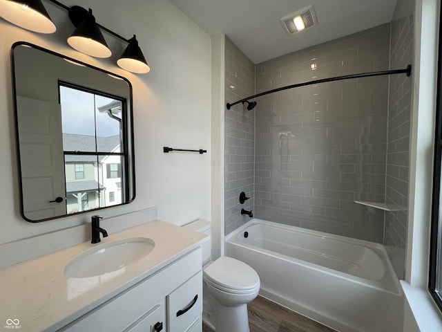 457 Mariposa Trl, Carmel, IN 46032 - full bath featuring wood finished floors, toilet, shower / bathtub combination, and vanity