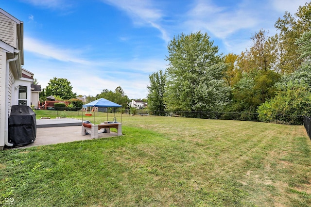 view of yard featuring a patio and a fenced backyard