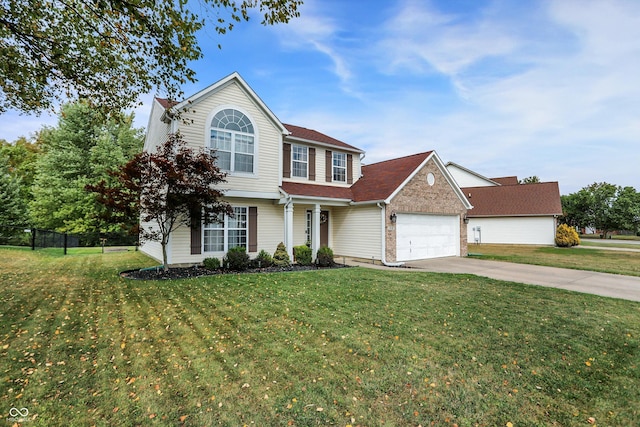 view of front of property with an attached garage, concrete driveway, a front yard, and fence