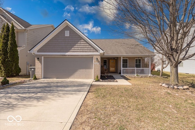 view of front of property with driveway, brick siding, a porch, and an attached garage