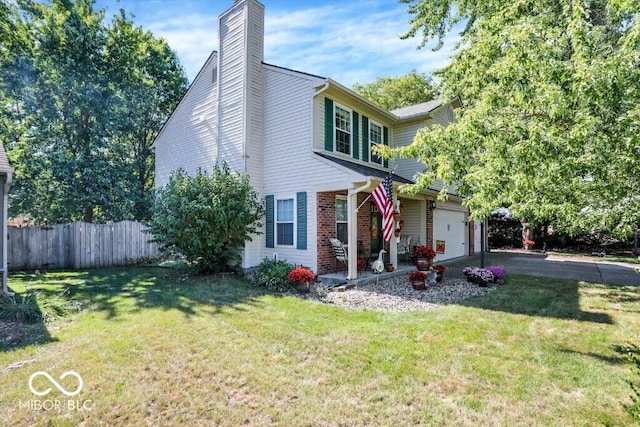 view of front of property featuring aphalt driveway, a chimney, a front yard, and fence