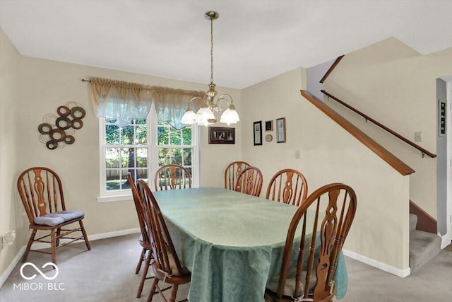 dining area with a notable chandelier, stairway, carpet flooring, and baseboards