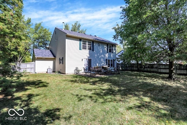 back of property featuring a yard, a patio area, central AC unit, and fence