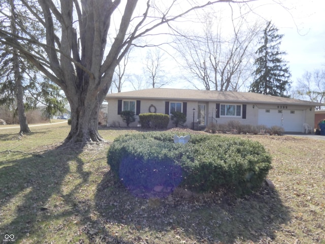 ranch-style home with an attached garage