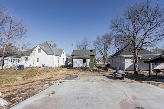 exterior space featuring an outbuilding