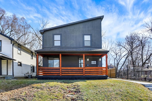 1209 N Rural St, Indianapolis, IN 46201 - rear view of property with a porch and a yard