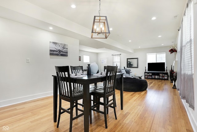 1209 N Rural St, Indianapolis, IN 46201 - dining room featuring visible vents, baseboards, light wood finished floors, recessed lighting, and a chandelier