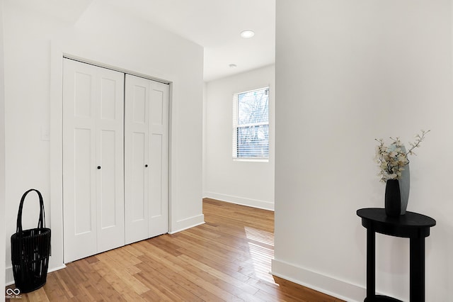 1209 N Rural St, Indianapolis, IN 46201 - bedroom with light wood-style floors, baseboards, and a closet