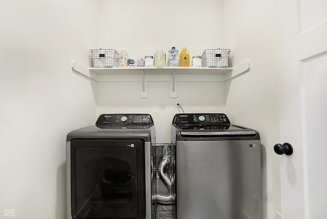 1209 N Rural St, Indianapolis, IN 46201 - laundry room with separate washer and dryer and laundry area