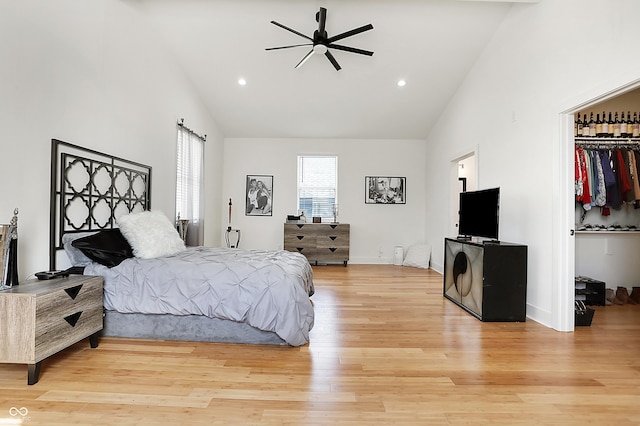 1209 N Rural St, Indianapolis, IN 46201 - bedroom featuring a walk in closet, high vaulted ceiling, recessed lighting, light wood-style floors, and ceiling fan