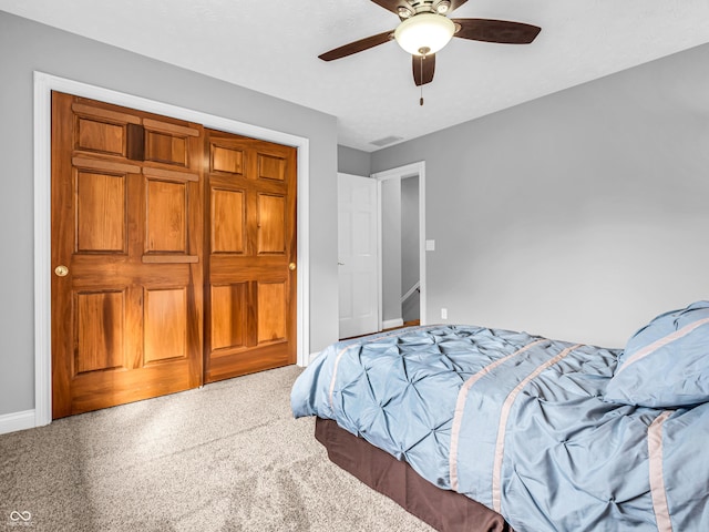 bedroom with ceiling fan and baseboards