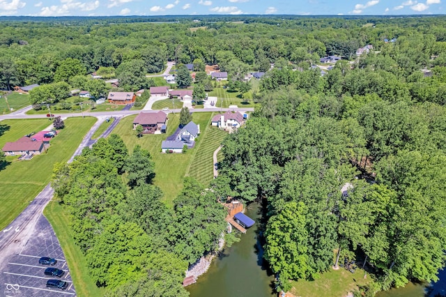 bird's eye view featuring a forest view