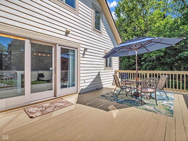 deck featuring outdoor dining space