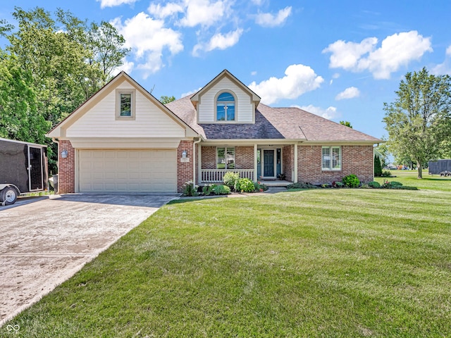 view of front of property with brick siding, a porch, concrete driveway, and a front yard