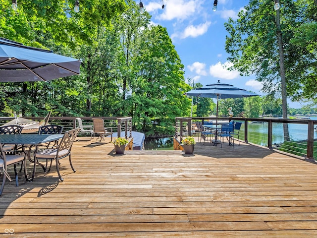 deck featuring outdoor dining area