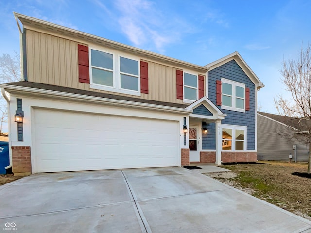 view of front of house with board and batten siding, brick siding, and driveway