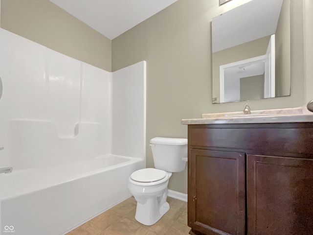 full bath featuring baseboards, toilet, bathtub / shower combination, and vanity