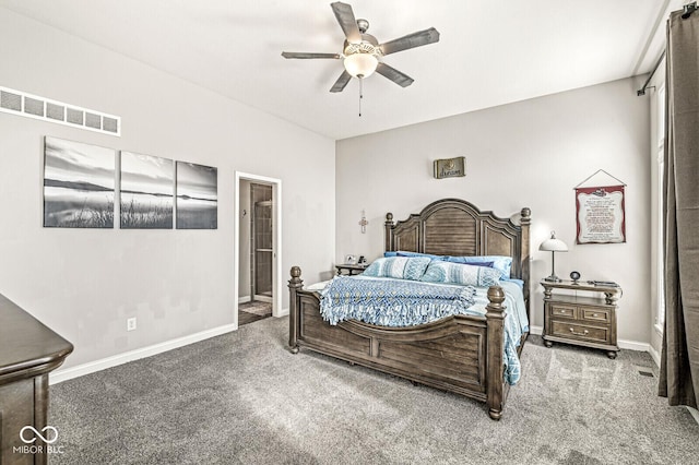 carpeted bedroom featuring connected bathroom, visible vents, baseboards, and ceiling fan