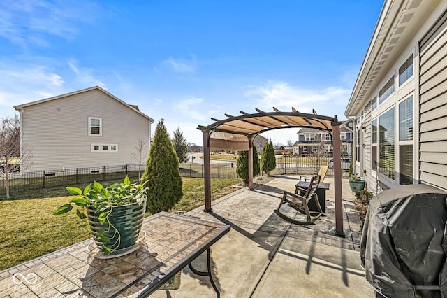 view of patio / terrace with grilling area, a pergola, and a fenced backyard